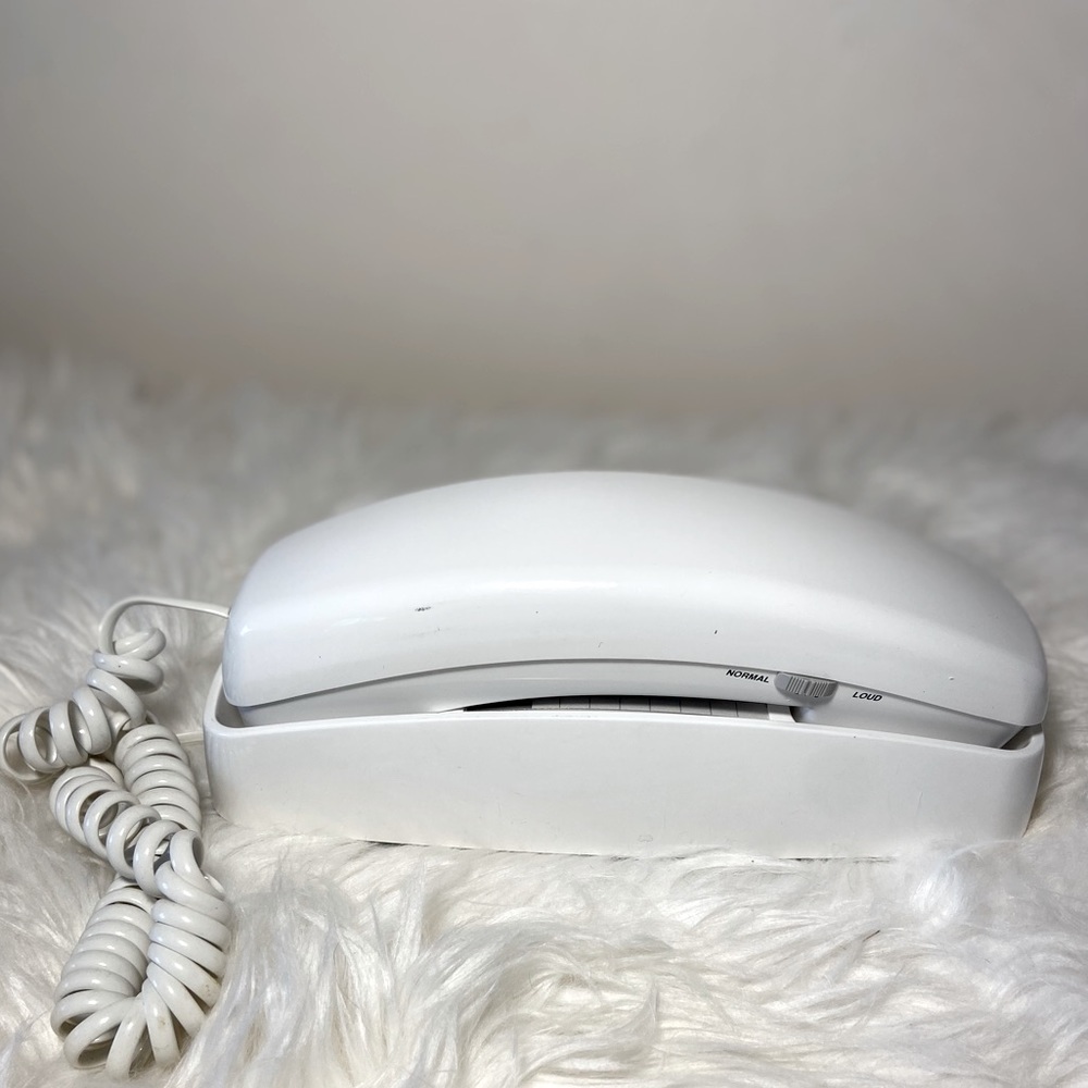 Vintage analog push button dial phone 1980s